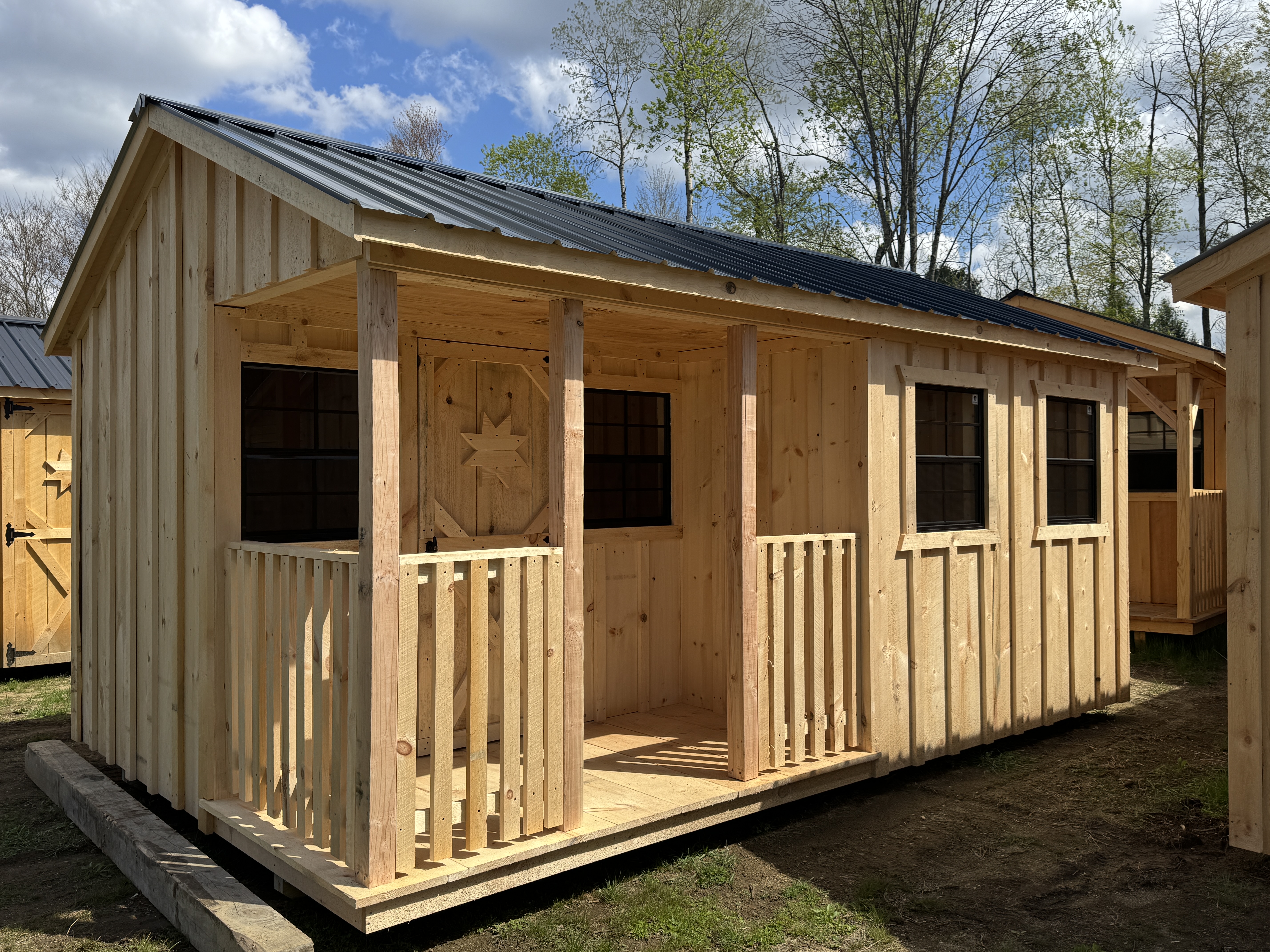 Cabin-style shed — front view